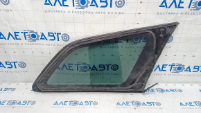 Window blind glass rear left Mazda CX-7 06-09 scratches on glass, scratches on chrome, tear of seal