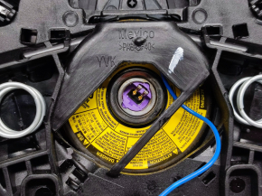 Airbag in the steering wheel driver VW Passat b7 12-15 USA the contour of the airbag is visible