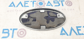 Subaru Outback 15-19 tailgate emblem minor scratches, chrome inside peeling, dent on chrome