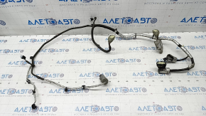 Wiring of rear bumper Ford Explorer 20 - under the parking brake and opening by foot