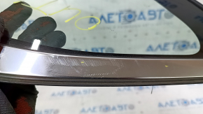 Window blind glass rear left Subaru Outback 15-19 scratches on chrome,