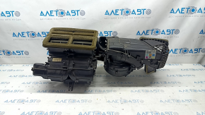 The bare heater housing of a Ford Mustang mk6 15-23