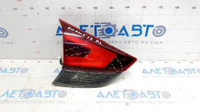 Light inside trunk lid left Nissan Rogue 17- scratches