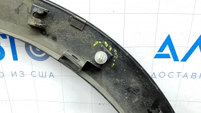 Front left wing arch trim Mazda CX-9 16 - broken mount, dented