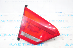 Light inside trunk lid left VW Passat b7 12-15 USA minor scratches