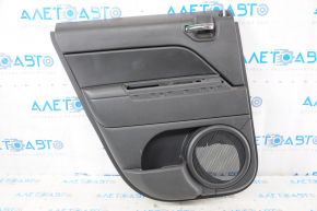 Door trim card rear left Jeep Patriot 11-17 black with black insert plastic, armrest rubber, scratches