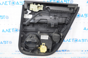 Door trim card rear left Jeep Patriot 11-17 black with black insert plastic, armrest rubber, scratches