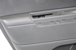 Door trim card rear left Jeep Patriot 11-17 black with black insert plastic, armrest rubber, scratches