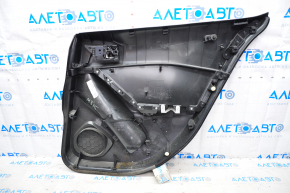 Door trim card rear left Mazda3 14-18 BM black with black insert cloth, armrest plastic, scratches