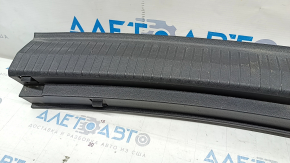 VW Tiguan 18 trunk opening trim - black, scratches, broken guide