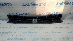 VW Tiguan 18 trunk opening trim - black, scratches, broken guide