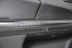 Door trim card front left Dodge Journey 11- black with black insert leather, armrest leather, gray stitching, dented armrest, scratches, needs cleaning