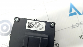 Buttons for folding the 3rd row of seats in the trunk of the Audi Q7 16-