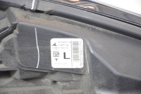 Tesla Model Y 20-LED front left headlight without mount, sand, dirt inside