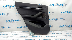 Door trim card rear left BMW X1 F48 16-22 leather black, black insert, backlight, scratches