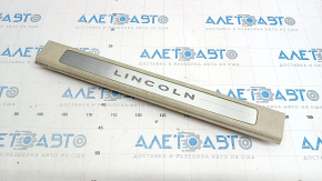 Door sill trim front left Lincoln MKC 15 - beige with backlight, worn