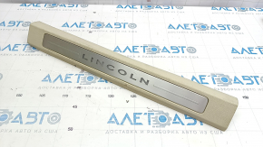 Door sill trim front left Lincoln MKC 15 - beige with backlight, worn, crack in fastening