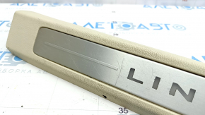 Door sill trim front left Lincoln MKC 15 - beige with backlight, worn, crack in fastening