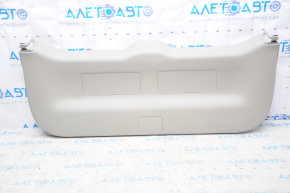 Lower trunk door trim Toyota Prius V 12-17 beige, plastic turned white, scratches