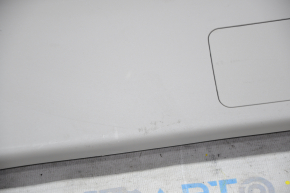 Lower trunk door trim Toyota Prius V 12-17 beige, plastic turned white, scratches