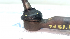 Steering rod with tip left Toyota Rav4 19 - rusty, torn boot
