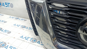 Radiator grill grill Nissan Rogue 17- under the camera, under the radar, under the round emblem, with the emblem, sand