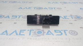 Chevrolet Volt 16 center console button block - worn, coating peeled off