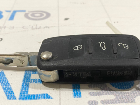 Key VW Passat b7 12-15 USA 4 buttons, folding, worn, crooked blade