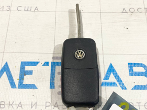 Key VW Passat b7 12-15 USA 4 buttons, folding, worn, crooked blade