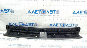 VW Tiguan 18 trunk opening trim - black, scratch