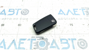 Key VW Tiguan 18- keyless 4 buttons, worn
