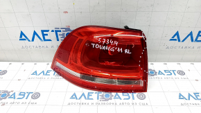 Light outer wing left VW Touareg 11-14 halogen, scratches, cracks, broken guide pads