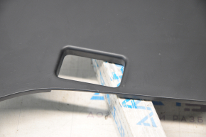 Tesla Model S 12-20 driver's footwell lower dashboard trim is worn, pokes