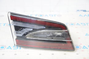 Light inside trunk door left Tesla Model S 12-20 scratches, dirt under glass