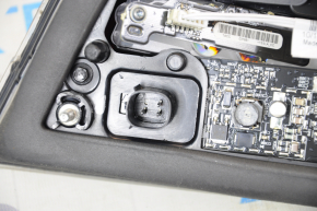 Light inside trunk door left Tesla Model S 12-20 scratches, dirt under glass