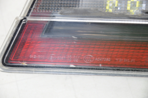 Light inside trunk door right Tesla Model S 12-20 scratches, dirt under glass