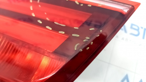 Inner taillight trunk lid left BMW X5 E70 11-13 rest, scratches, crack