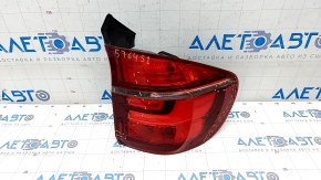 Light outer wing right BMW X5 E70 11-13 rest, cracks on glass, scratches