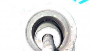 The lower rear right transverse control arm of a BMW X5 F15 14-18 has a torn silent block and broken bolt.