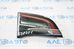 Light inside trunk lid left Tesla Model 3 18- type 2 small scratches