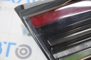 Light inside trunk lid left Tesla Model 3 18- type 2 small scratches