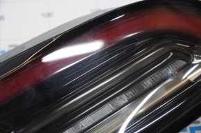 Light inside trunk lid left Tesla Model 3 18- type 2 small scratches