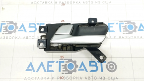 Inner front left door handle for a 1995 Hyundai Sonata (USA)