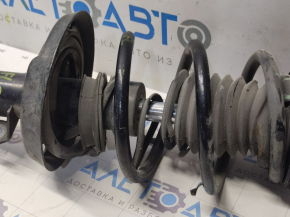 Shock absorber strut assembly front left Chevrolet Cruze 16 - torn boot