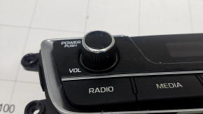 Hyundai Sonata 15-17 clock panel with radio control, scratches, chrome peeling