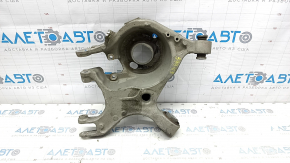 Lower arm under the spring rear right Ford Edge 15 - cracked silent block, broken fragment
