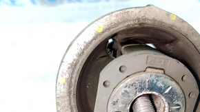 Lower arm under the spring rear right Ford Edge 15 - cracked silent block, broken fragment