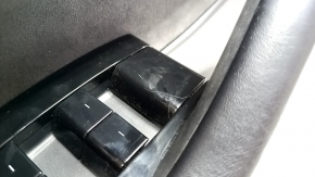 Door trim card front left Tesla Model Y 20 - black leather, with backlight, glossy trim, with suede insert, with window lift control, with door opening button, cracks