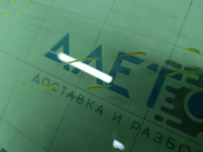 Glass of the front left door VW Atlas 18 - scratches