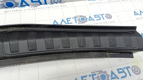 Alfa Romeo Stelvio 18 trunk opening trim - black, scratches, abrasions